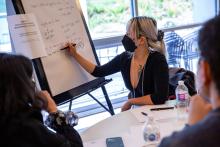 Artist Emily Chou takes notes during a story group meeting (photo: Gabriele Dumpys Woolever)
