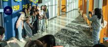 A group of VSP students takes pictures at the Welcome Day Event photo booth (photo: Bohdan Lee/Vancouver Summer Program)