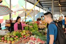 UBC undergraduate Josh Lee at the local farmer's market in Hilo, Hawai'i during his Global Seminar in February 2023 (photo: Ahmed Neelim Novo)